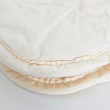 Load image into Gallery viewer, Pure Wool Duvet - british made Toddler Duvet -sleeping duvet - nap pram and stroller duvet - Corner of the seam close up view of duvet - Little Scandi baby
